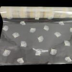 ROLO CELOFANE 70CMX50MTS FLORES COR:BRANCO