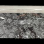 ROLO CELOFANE 70CMX50MTS FLORES COR:BRANCO