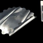 NAPERON METALIZADO 50UNID DIA.48CM COR:PRATEADO